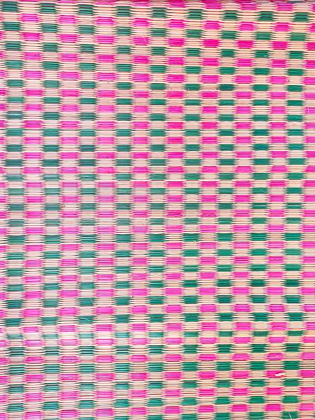 A green and pink checkered cloth