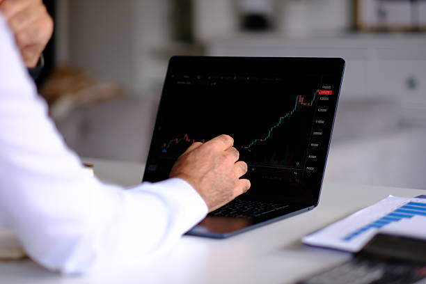 istock a businessman who analyzes financial and economic statements 2239150415