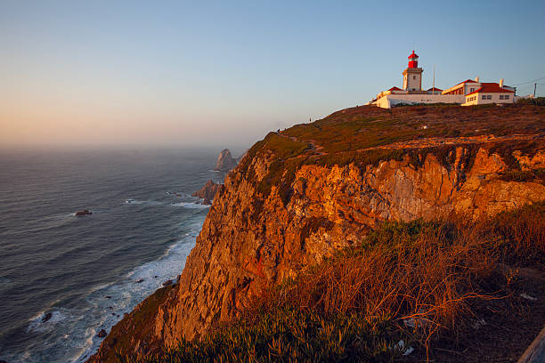 istock Lighthouse on Cabo da Roca - Roca Cape, westernmost point of the Sintra Mountain Range and Europe in Portuga 2239157413