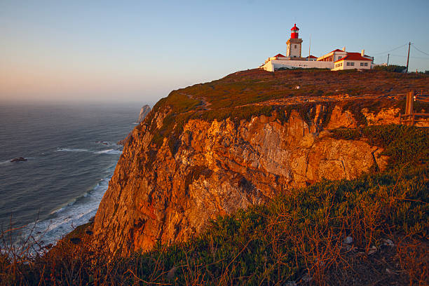 istock Lighthouse on Cabo da Roca - Roca Cape, westernmost point of the Sintra Mountain Range and Europe in Portuga 2239158821