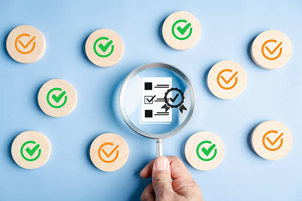 istock Document check and certificate approval with magnifying glass on checklist and verified badge, quality assurance, compliance, standard validation, and certification. 2239160842