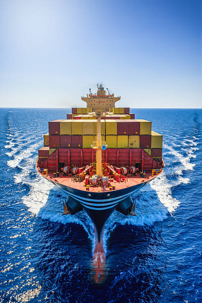 istock Front view of a large industrial container cargo ship in motion 2239165287