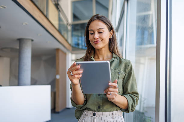 istock Businesswoman using digital tablet technology in modern office 2239165757