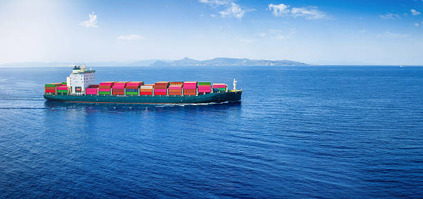 istock Aerial view of a container cargo ship in motion as a concept for transport 2239170618