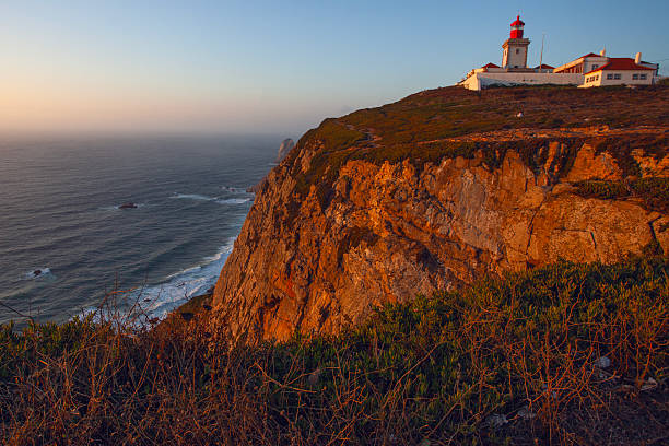 istock Lighthouse on Cabo da Roca - Roca Cape, westernmost point of the Sintra Mountain Range and Europe in Portuga 2239171546