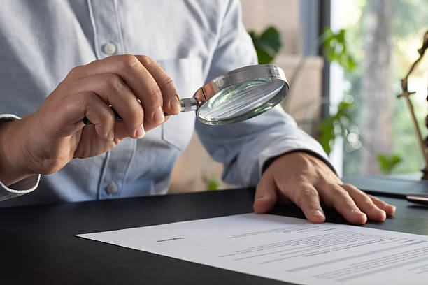 istock Lawyer signing an official document in the office 2239174343