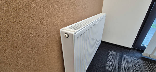 istock Radiator Installed Along Cork Wall in Office Interior 2239177526