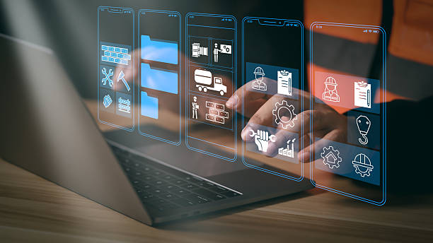 istock A construction worker sitting at a desk, working on a laptop. The image highlights the integration of technology in construction, focusing on digital tools, safety, and project management. 2239178911