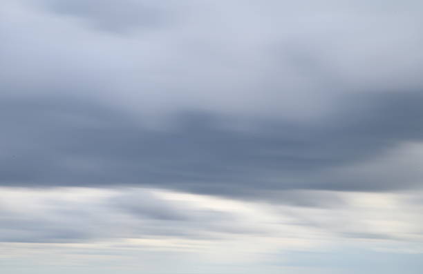 Abstract blurred view of a moody sky. Artistic marine background with a dramatic and atmospheric feel, perfect for use in design or as a backdrop. High quality photo with copy space