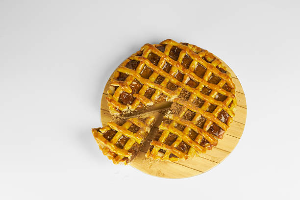 istock Apple pie, crispy pastry close-up on a white background 2239191673