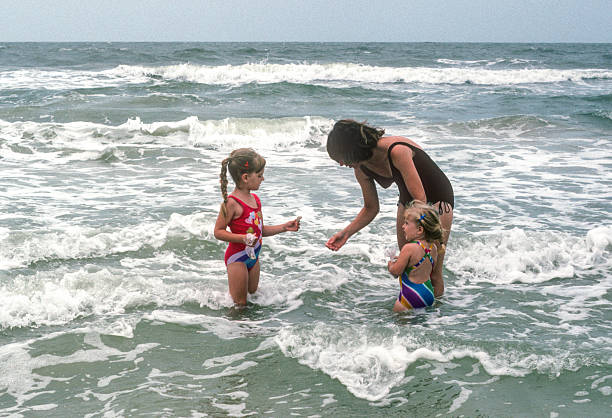 istock Clearwater FL - Mother & Daughters in the Water - 1984 2239195710