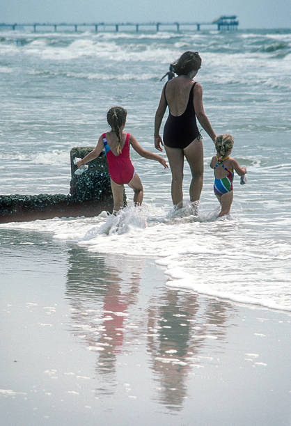 istock Clearwater FL - Mother & Daughters Reflection - 1984 2239195758