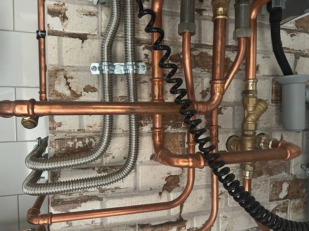 istock Copper pipes and valves – industrial plumbing installation 2239196836