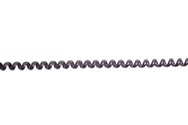 Black spiral telephone cord isolated on white background