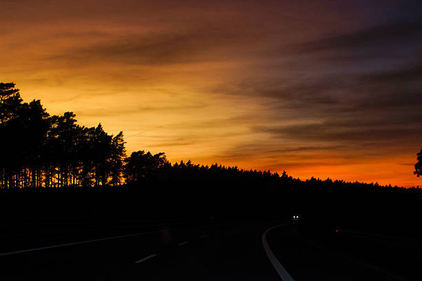 Highway wiev of contrast orange sunset