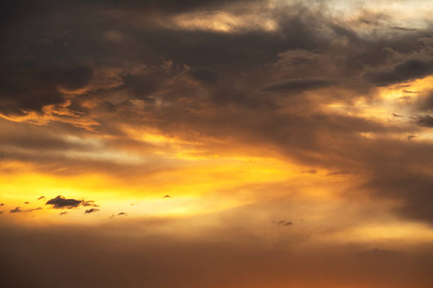 Bright beautiful autumn  sunset sky with clouds.