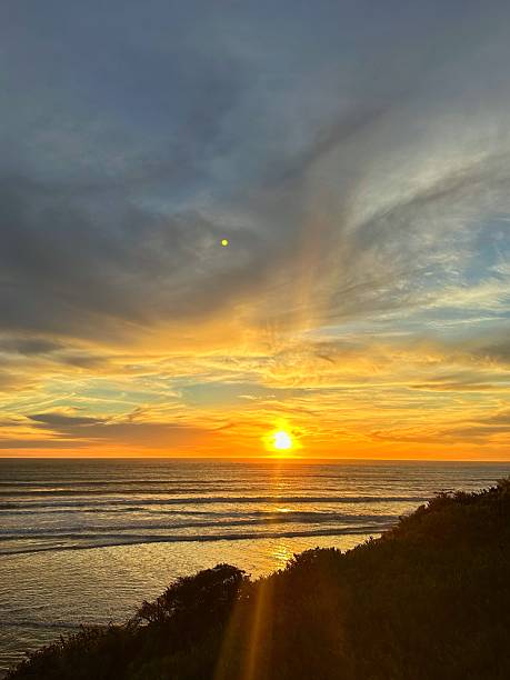 istock Golden Hour Sunset by the Pacific 2239217188