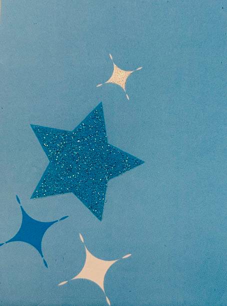 istock blue background with stars and geometric shapes 2239217385