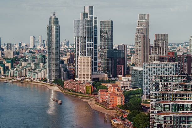 istock Residential buildings by the river Thames 2239223843
