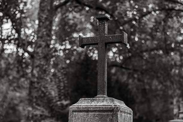 istock Christian cemetery, Religious cross, grave headstone. 2239237705