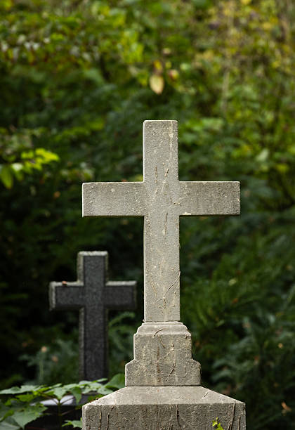 istock Old Christian cemetery, Religious cross, headstone. 2239237744