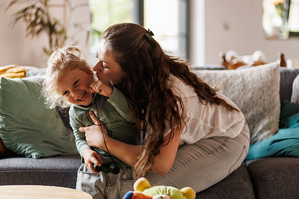 istock Tickles and cuddles between mother and her toddler son 2239252517