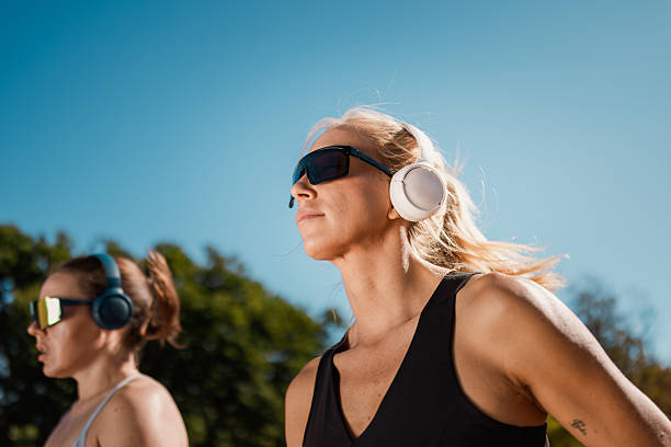 istock Sporty Women In Motion On Sunny Day 2239252721