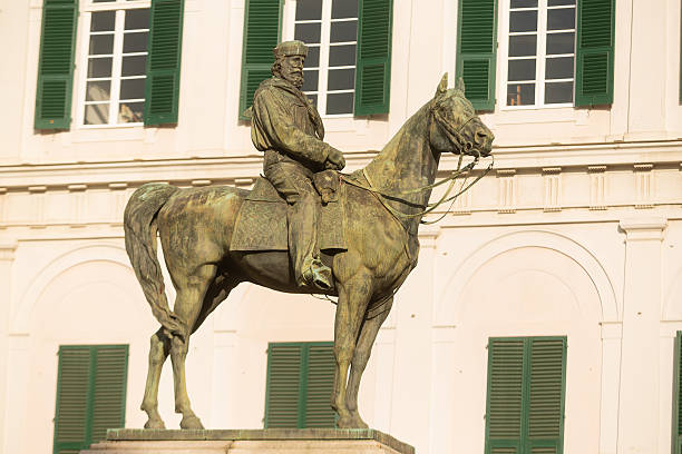 Genoa, Italy, June 12, 2023: Outdoor view of the statue of Giuseppe Garibaldi which is an equestrian bronze monument located in front of the Teatro Carlo Felice in Piazza De Ferrari, the main square of the city. Created in 1879 by Italian sculptor Augusto Rivalta
