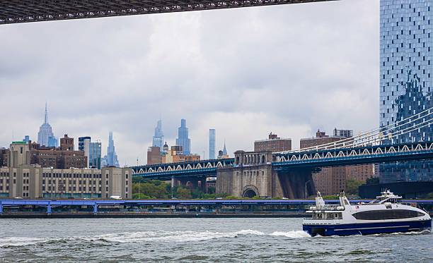 istock Lower Manhattan skyline with waterfront docks and boats 2239254612