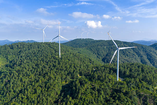 istock Wind turbine on the mountaintop in the forest 2239262244