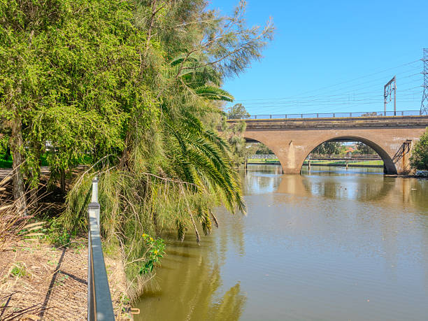 istock Historical Brick arched tunnel bridge for sydney Meteo rail system over cooks river in inner west sydney suburb of Canterbury in NSW Australia. Originally was used for Cargo rail and Sydney Railway 2239270393