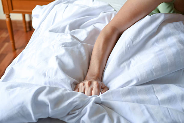 istock Fatigue and Connection: Couple Relaxing Indoors 2239286048