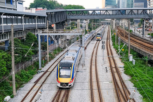 istock Suburban trains running through the city 2239291739