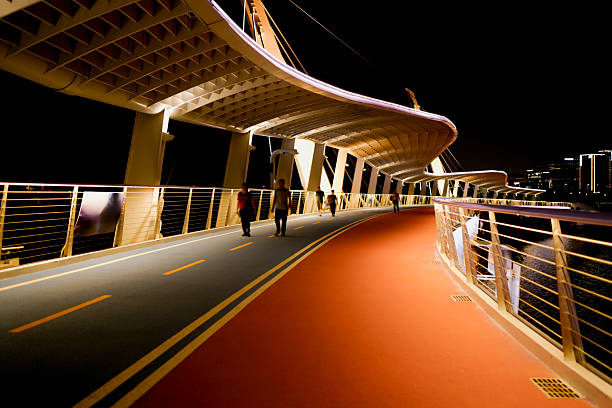 A person walking on the bridge