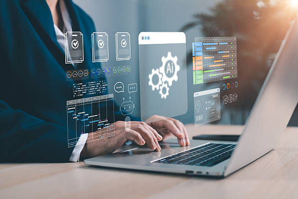 istock Businesswoman using AI technology for project management, workflow automation and data analytics on laptop. Modern artificial intelligence solutions for corporate digital transformation. AI project 2239302228