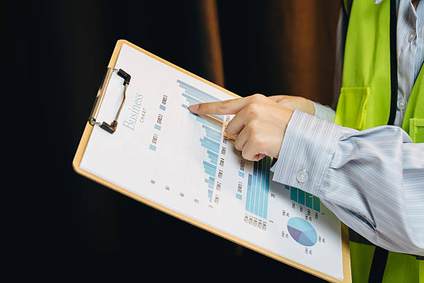istock Business presentation with graphs and charts on clipboard, professional analysis in office environment for financial review 2239307755