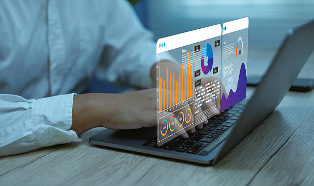 istock Businessman analyzing digital data hologram charts working on laptop, Concepts big data digital analytics, business intelligence, financial report, AI-driven dashboard for decision making 2239308173