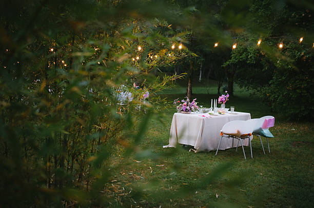 Wedding table with fresh flowers decoration. Forest / garden wedding