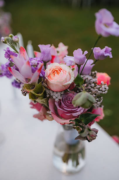 istock Wedding table with fresh flowers decoration. Forest / garden wedding 2239315298