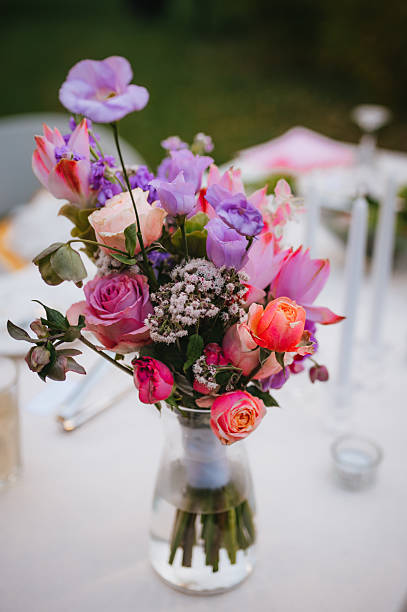 istock Wedding table with fresh flowers decoration. Forest / garden wedding 2239315299