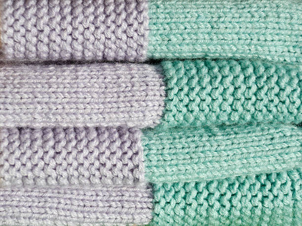 istock A textured winter yarn in hand-woven mint green and lavender. 2239318632