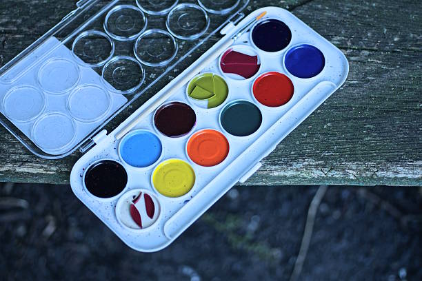 istock part on a white open plastic box with a set of colored paints for drawing 2239318704