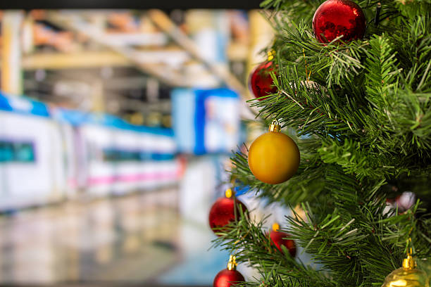 istock train station location with a decorated Christmas Tree 2239320389