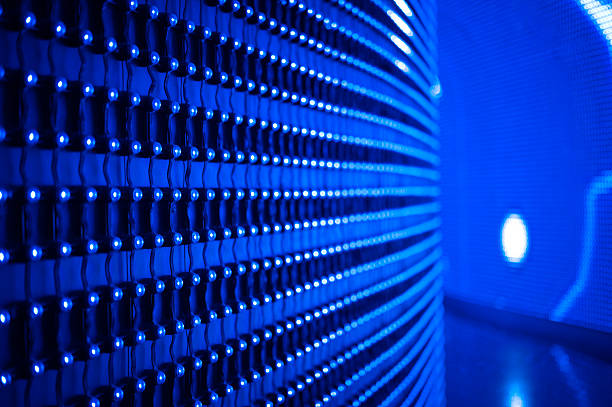 istock Garland lights with a blurred bokeh effect. Festive blue decorative lighting in a perspective concept. 2239323526