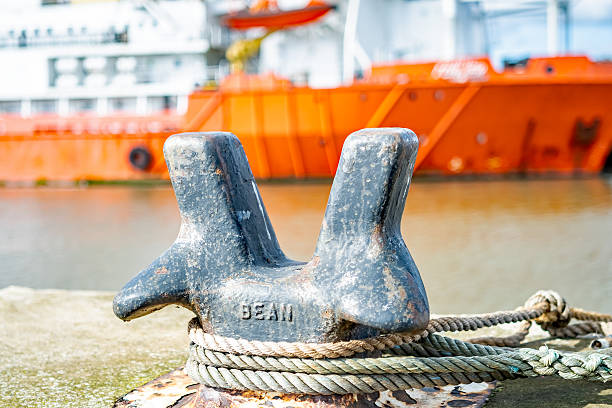 Great Yarmouth, Norfolk, UK  September 08 2019. Close up of mooring ring with an out of focus boat in the background