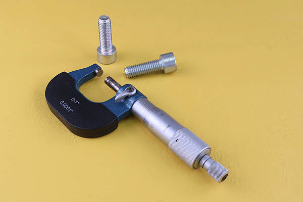 Vernier rotating scale of a precision micrometer. Macro photography.