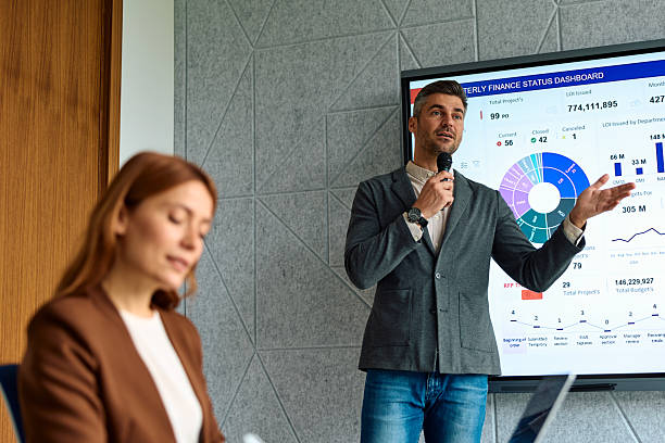 istock Speaker presenting financial data during corporate business meeting 2239333831