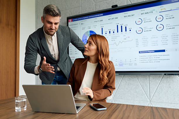 istock Business colleagues analyzing financial data in office meeting 2239334653