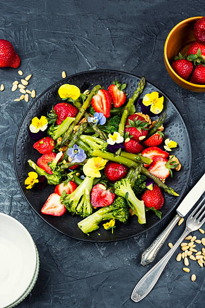 istock Simple salad with strawberries and asparagus. 2239335329