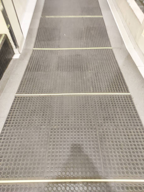 istock A downward-sloping hallway with a rubber ramp 2239341217